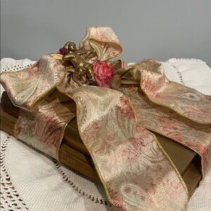 Elegant Pink and Gold Decorative Ribbon on books decor 90’s  with Angel on top